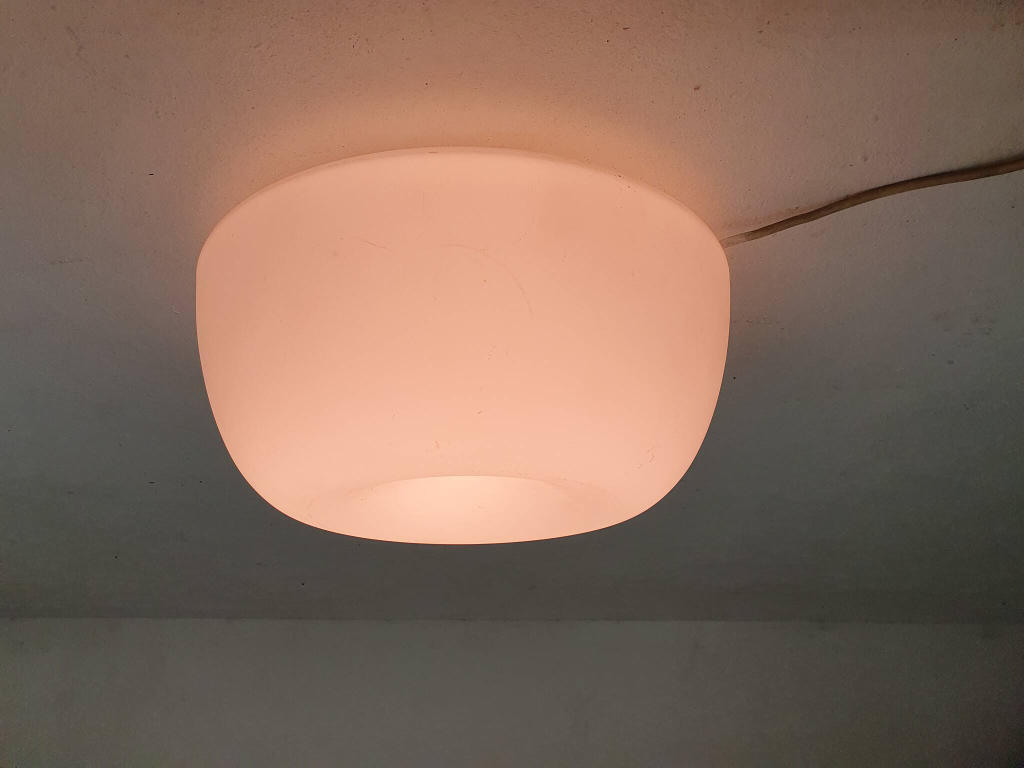 Milk glass ceiling or wall light by Glasshutte Limburg, Germany 1970's