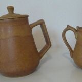 Old coffee maker and sandstone pitcher