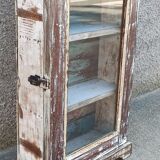 Old small wooden wardrobe with glass door