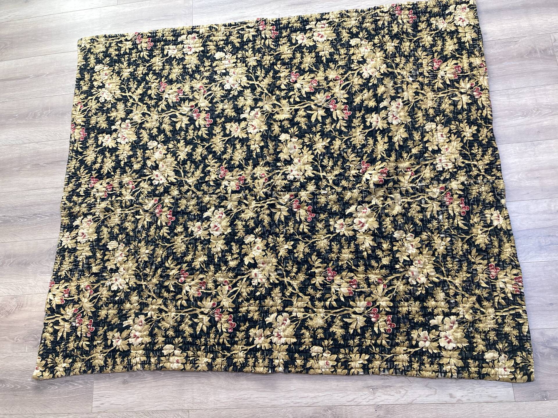 Antique hand-stitched boutis bedspread, floral fabric, 19th century.