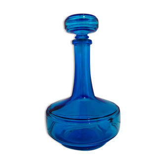 Bottle of old perfume of blue color