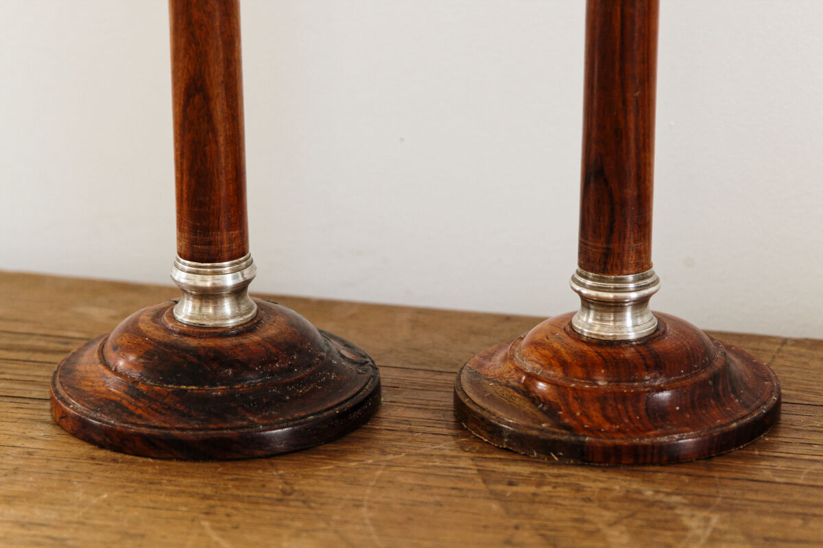Pair of Indian candle holders, wood and silver metal
