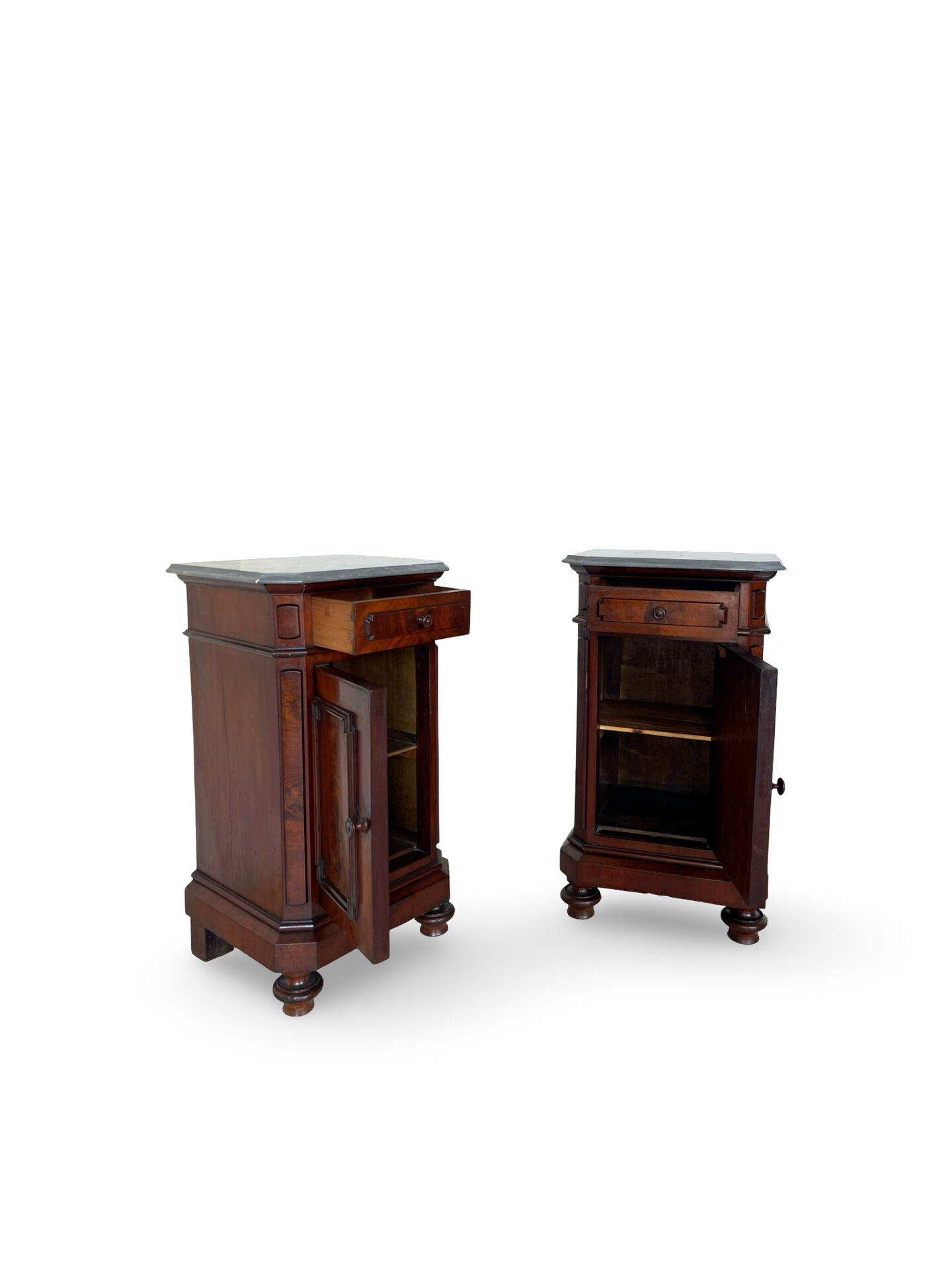 A pair of antique walnut bedside tables from the 1890s.