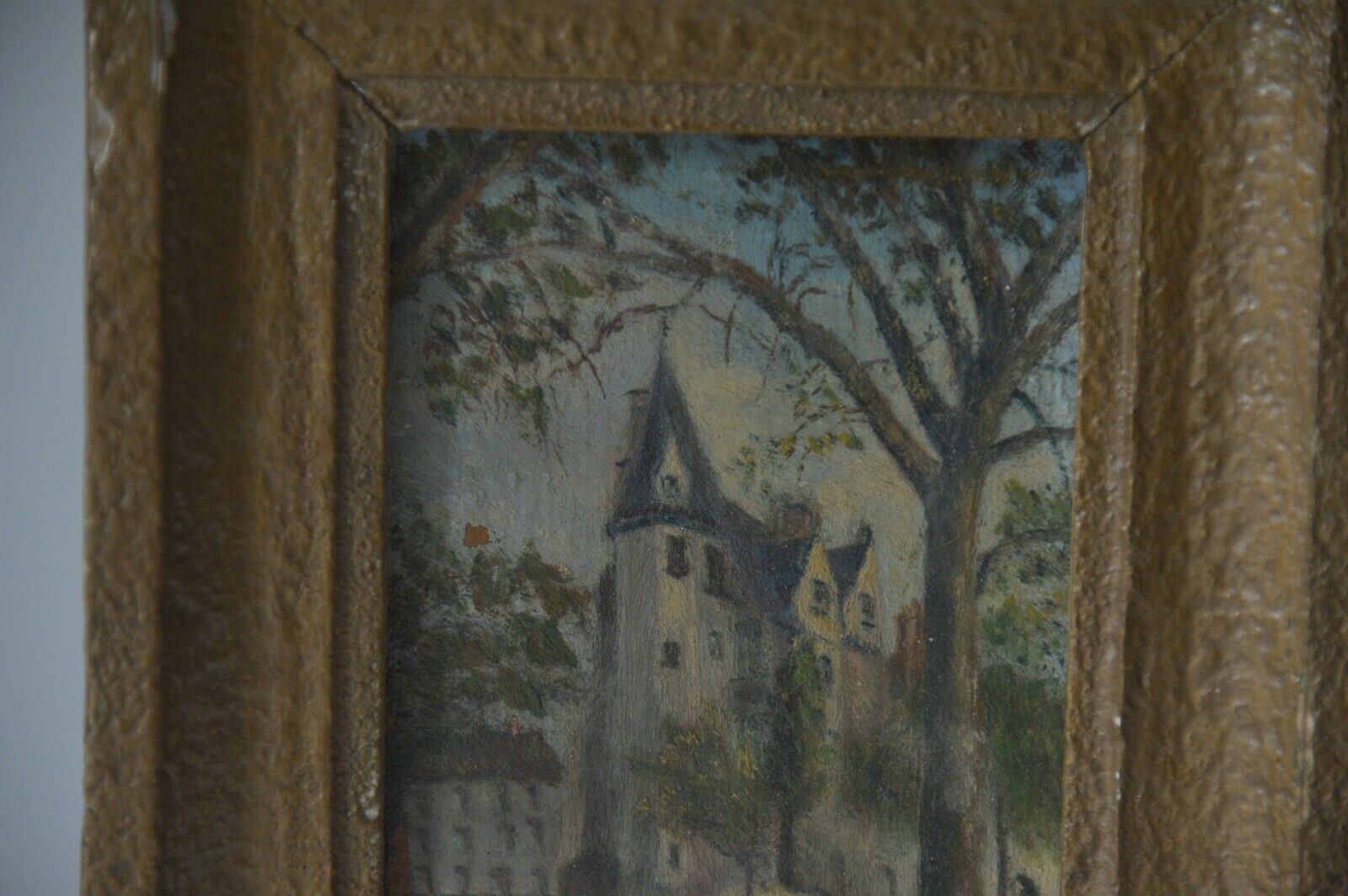 Peinture à l’huile sur panneau Château signée