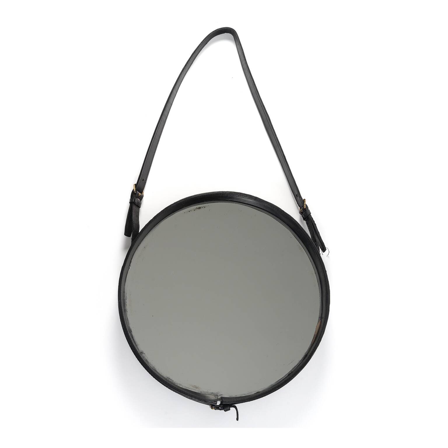 Leather strap mirror attributed to Jacques Adnet, France, 1960s.