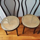 4 antique curved wood and cane chairs