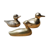 Trio of brass ducks