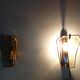 Pair of brass and curved glass wall lamps from the 80s