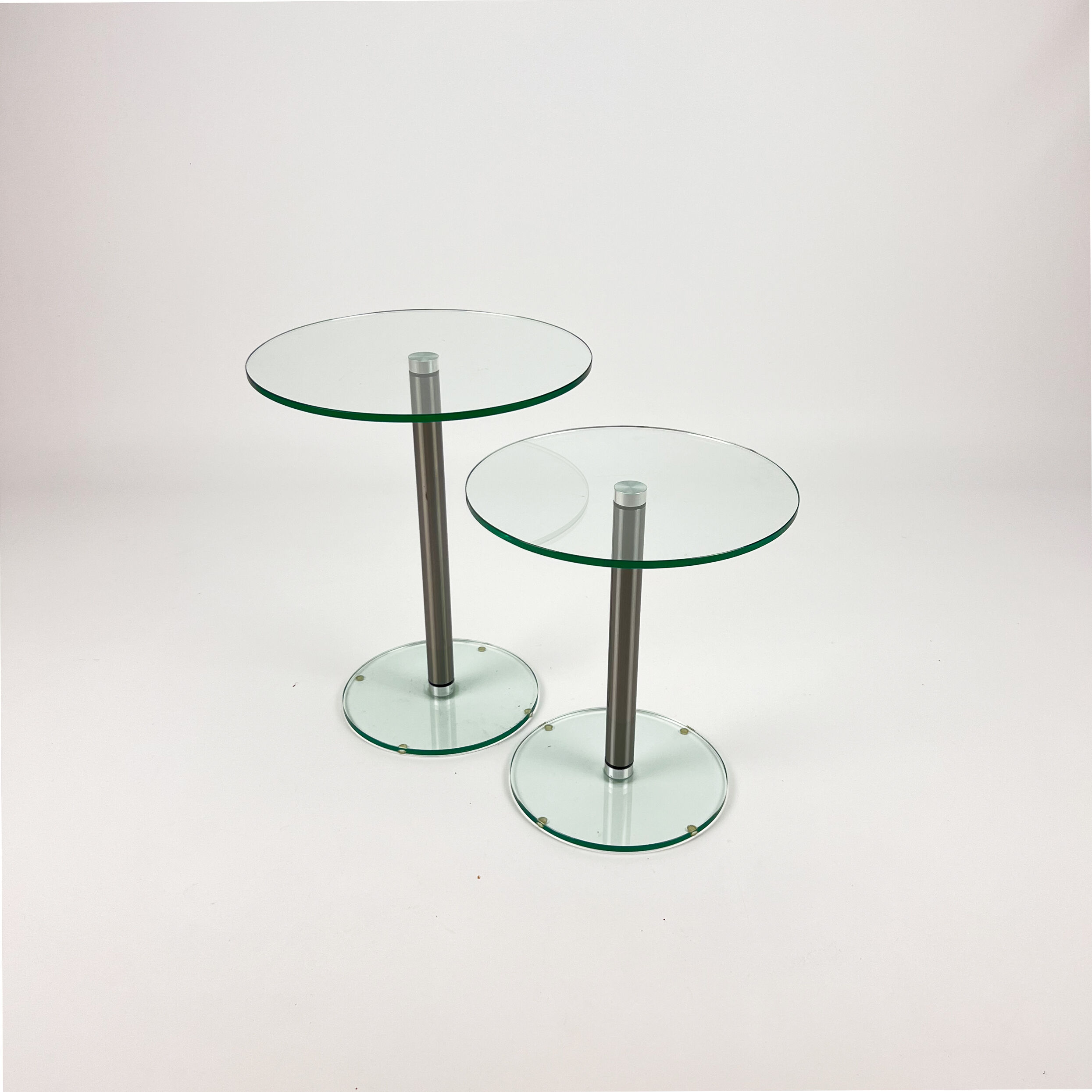 Set of 2 postmodern glass and steel side tables, 1990s