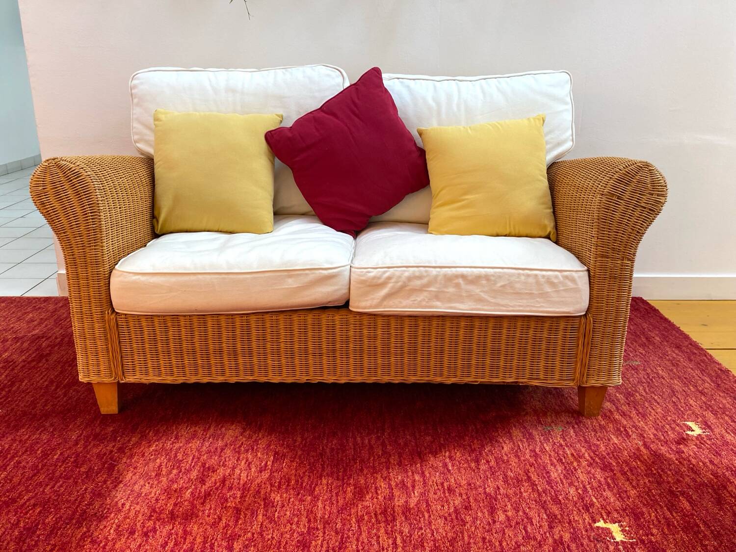 Antique 2-seater rattan sofa from the 70s