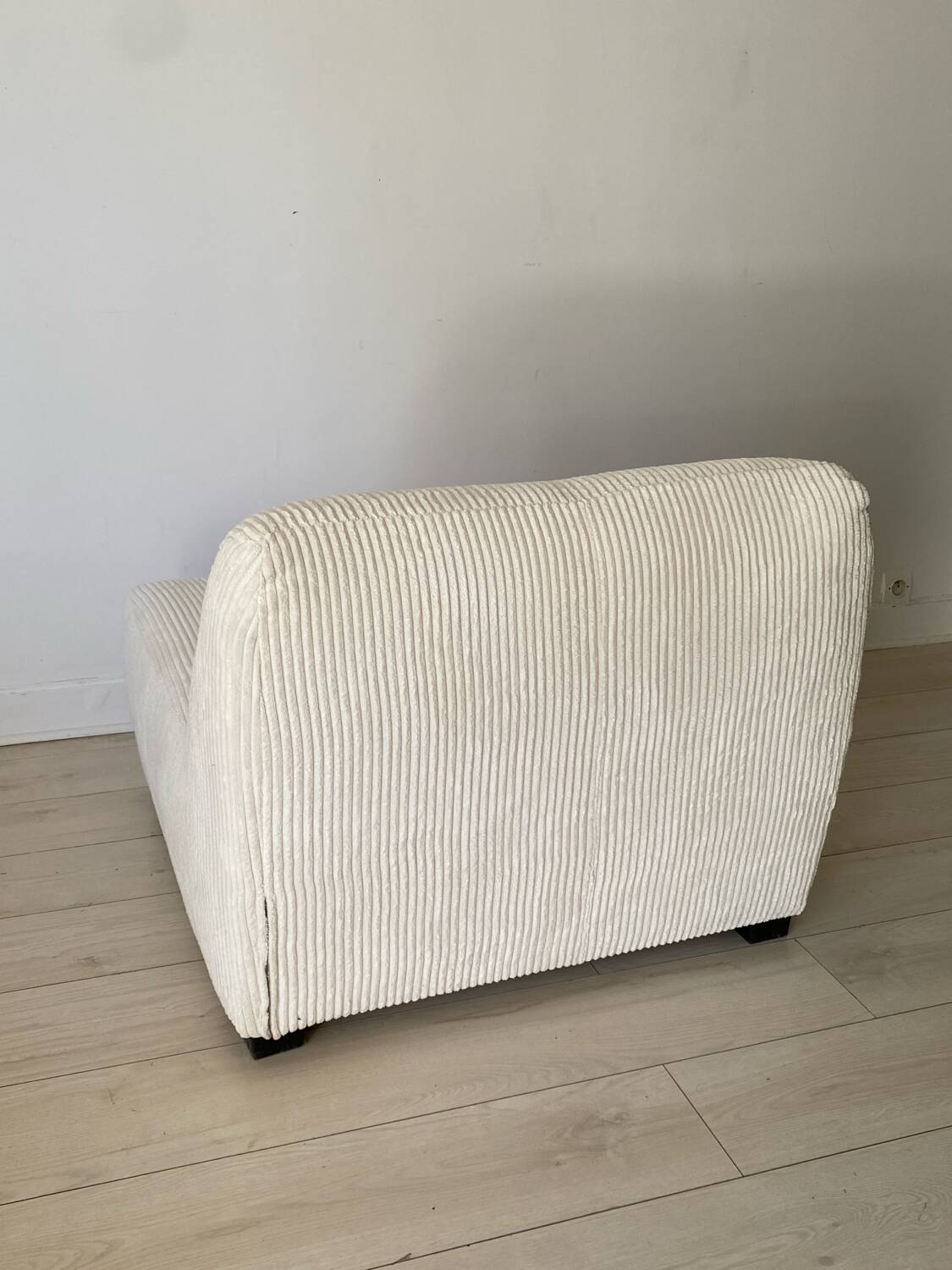 White corduroy armchair