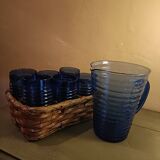 Orangeade carafe service and 6 glasses in a wicker basket
