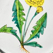 Decorative wall plate in earthenware and pewter with dandelion