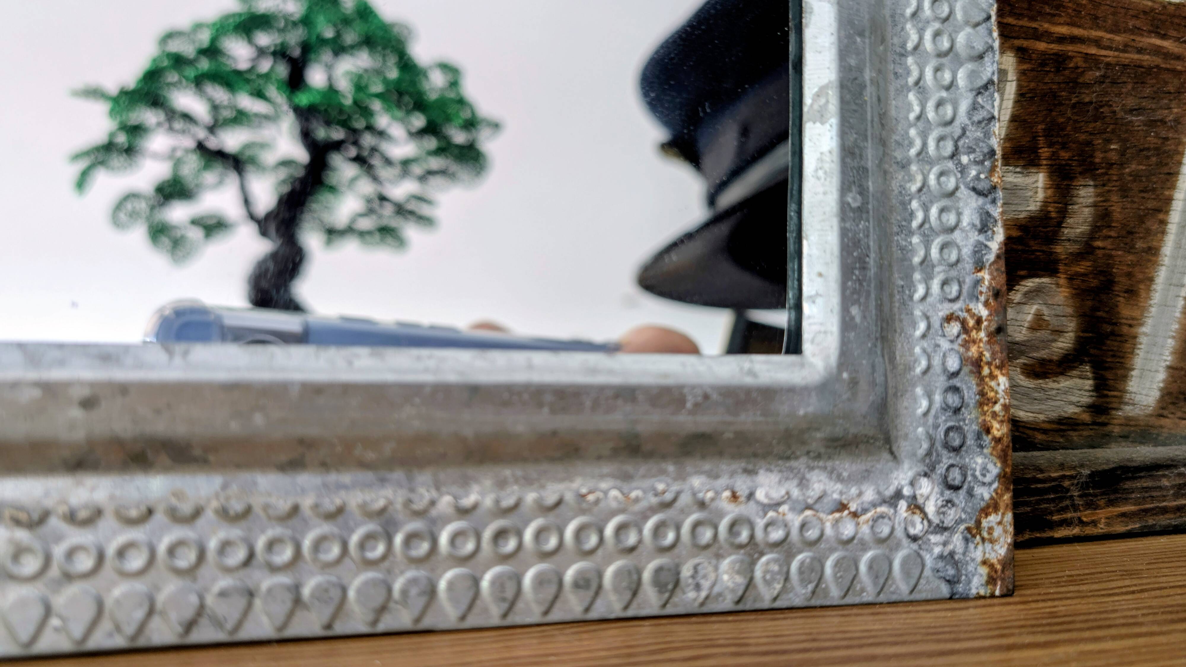 Antique rectangular mirror, hammered metal frame 35 x 25 cm