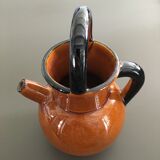 Glazed amber jug