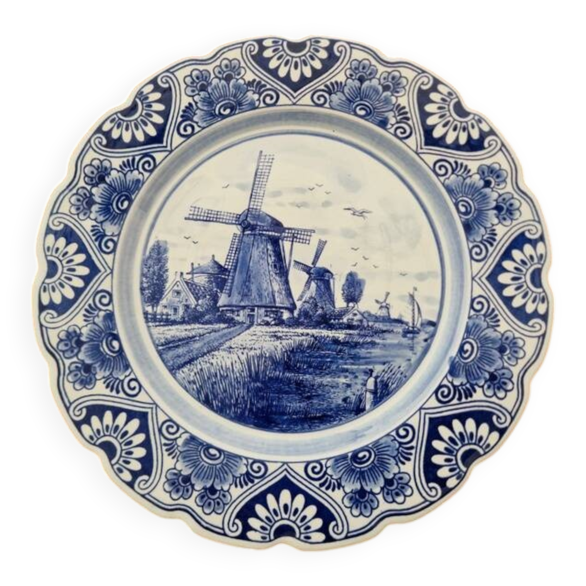 Delft Blue earthenware plate with a mill by a river decoration