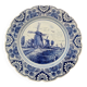 Delft Blue earthenware plate with a mill by a river decoration