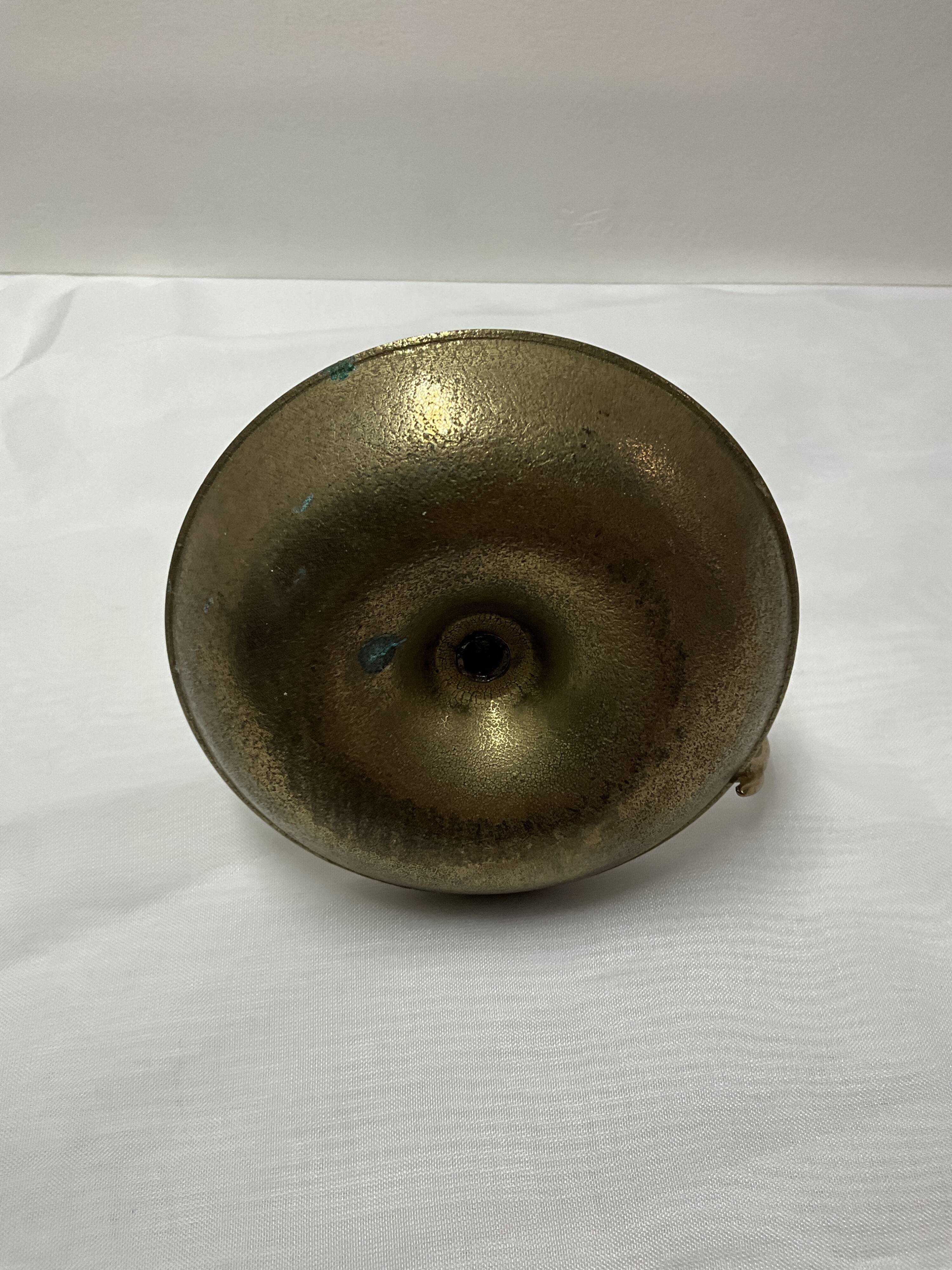 Brass hand candle holder
