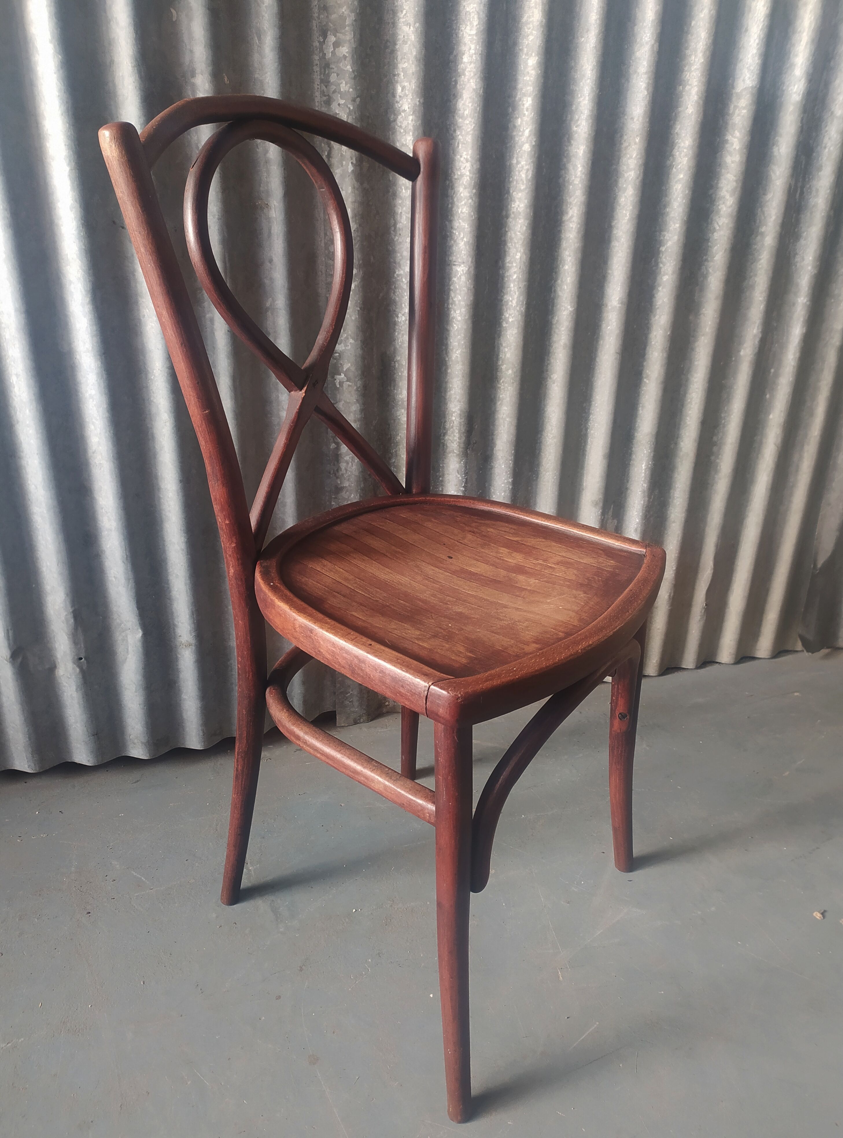 Curved wooden bistro chair