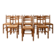 Set of 8 vintage wooden chairs with rush seats.