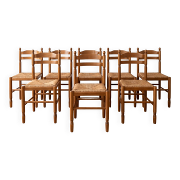 Set of 8 vintage wooden chairs with rush seats.