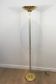 Designer floor lamp in gilded brass and plexiglass
