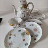 coffee pot, cup and saucers