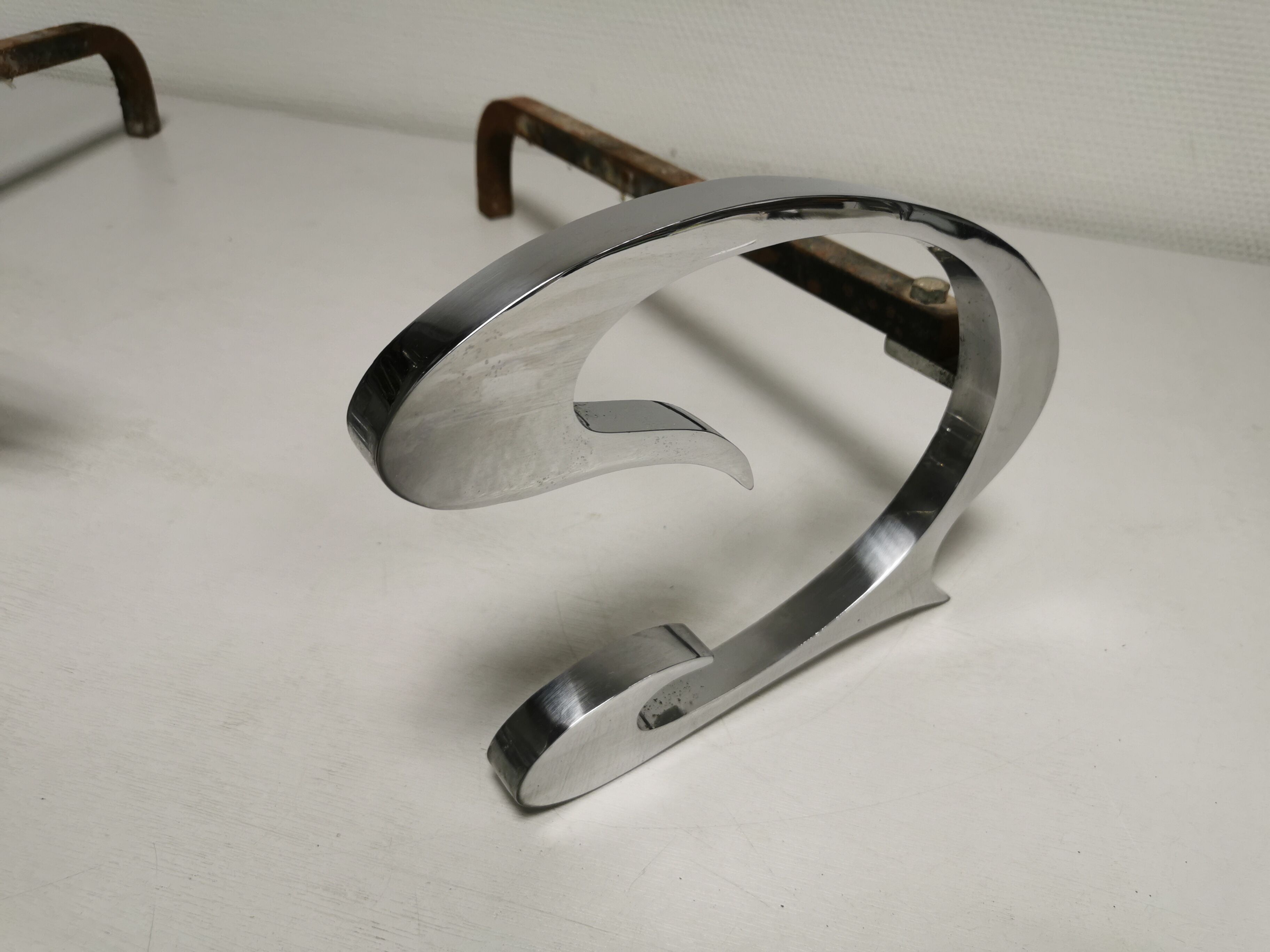 Pair of andirons in brushed steel and metal edition Jean-Paul Créations circa 1970
