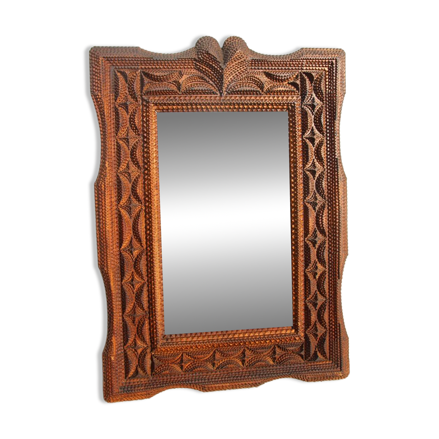 Tramp Art mirror from the 19th century in hand-carved wood.