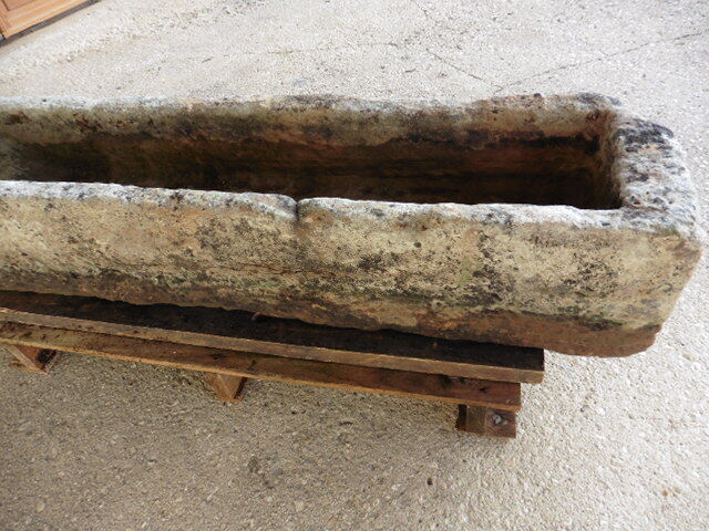 Old natural stone trough