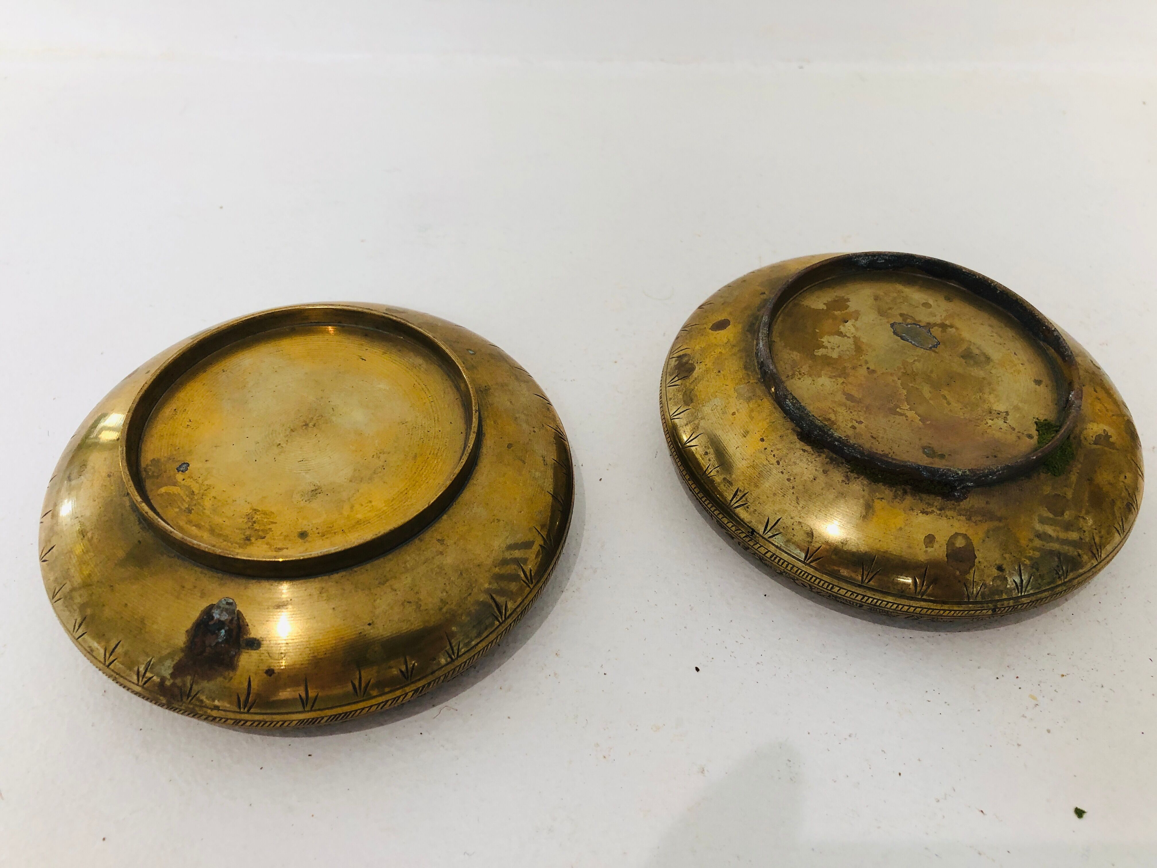 Pair of ostrich eggs on base, early 20th