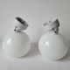 Duo of art deco wall lamps in porcelain and opaline