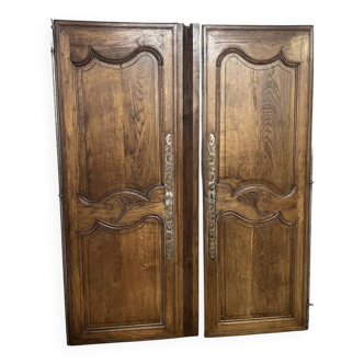 Pair of antique wardrobe doors and crosspiece