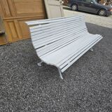Old cast iron garden bench and wooden slats