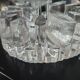 Large glass candle holder in iceberg brutalist style.