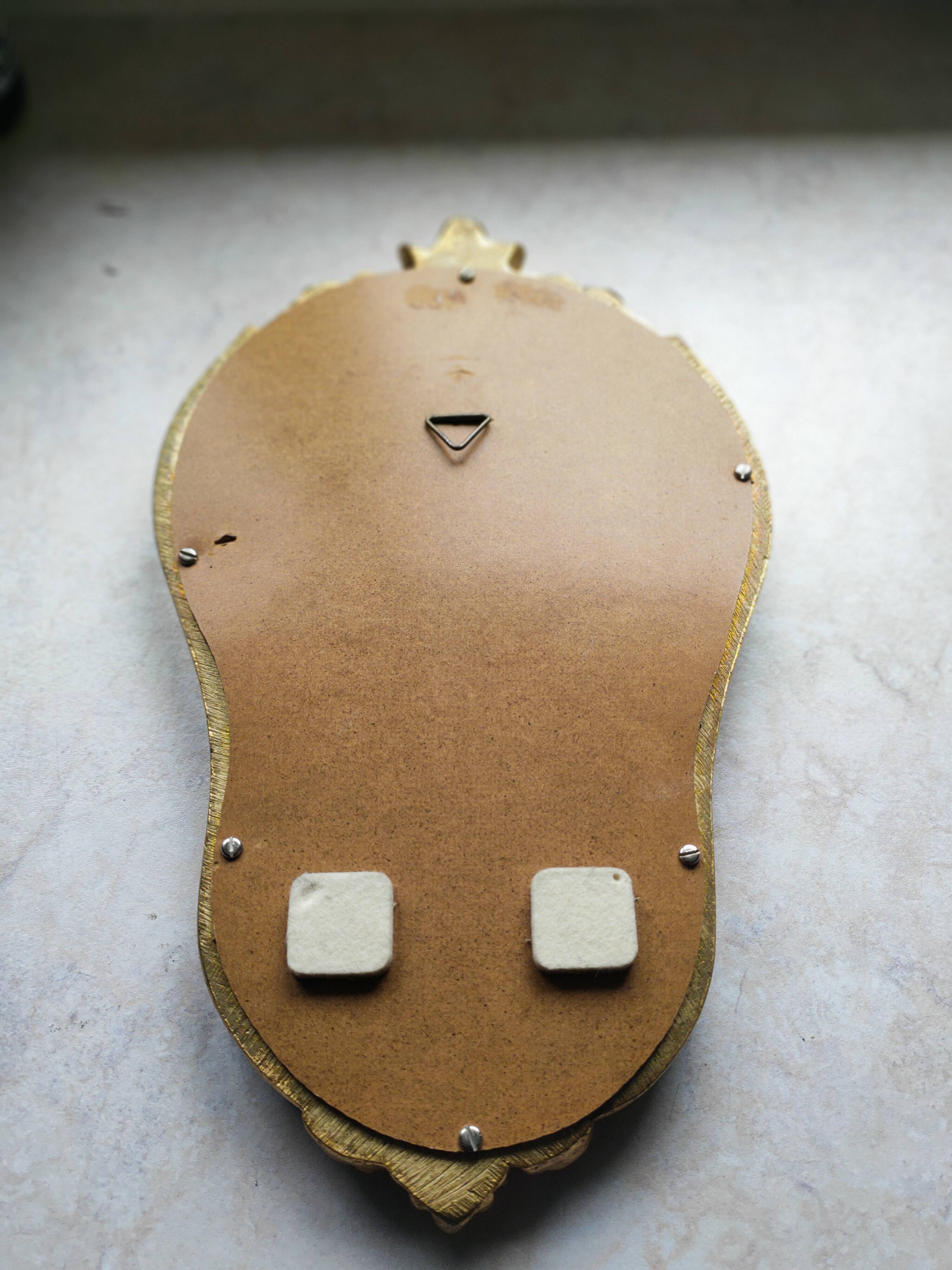 Baroque style gilded mirror.