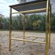 Vintage single bed and nightstand in gilded brass