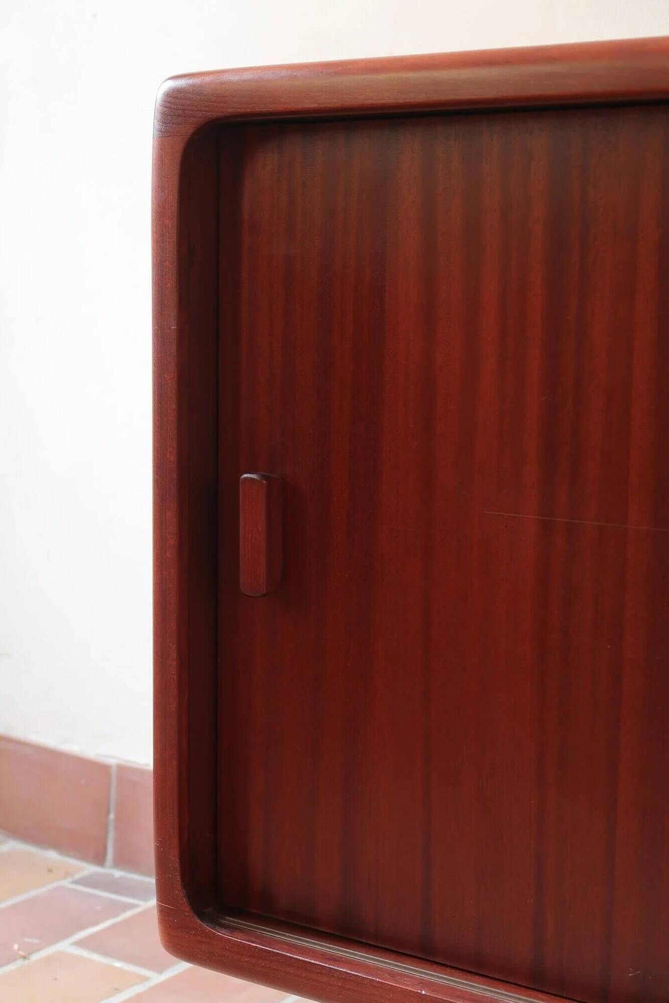 Teak enfilade, sliding doors, black faux leather top, 1970s.