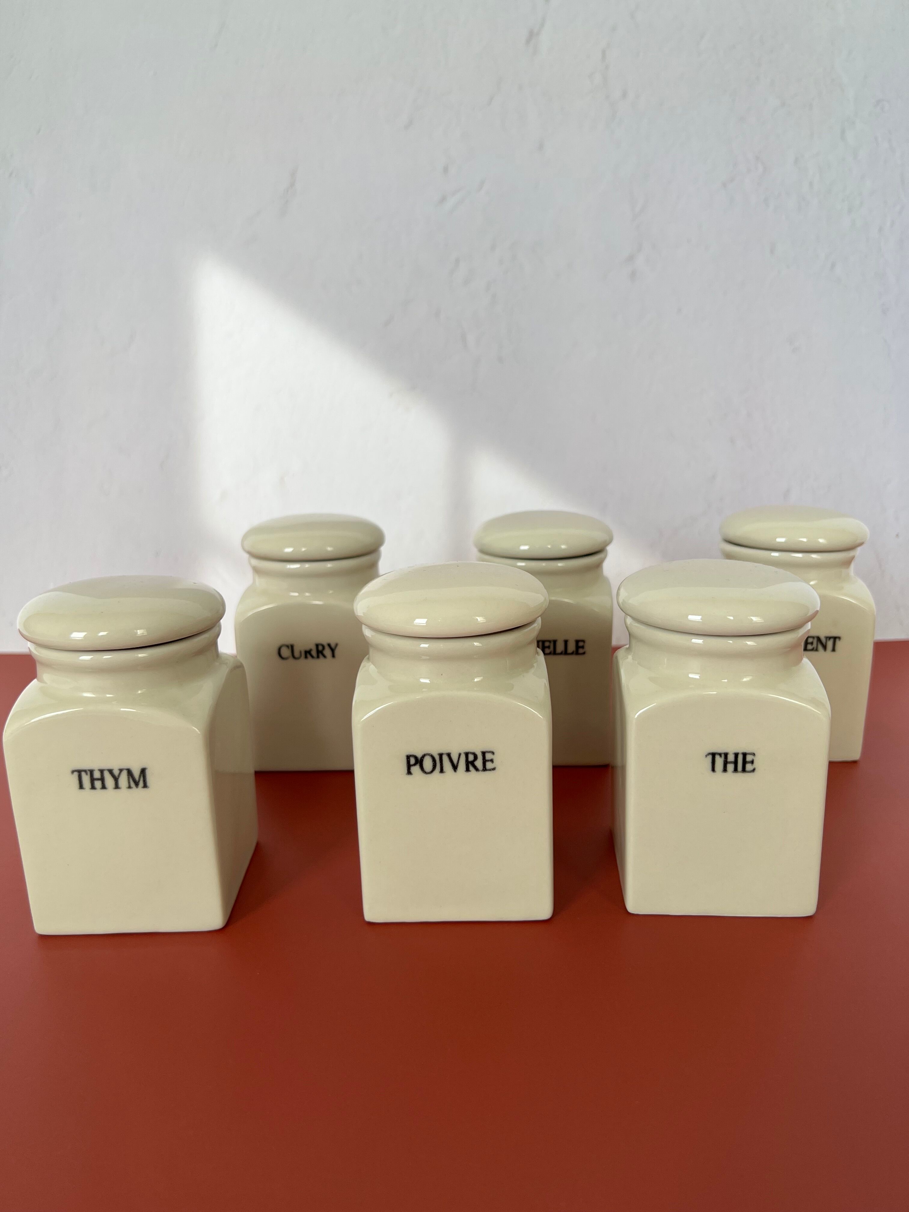 Set of vintage porcelain spice jars