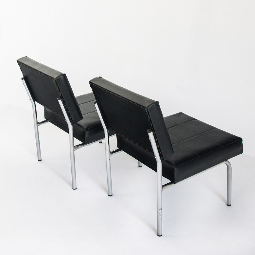 Pair of vintage low armchairs in chrome metal and skaï, Spain 1970