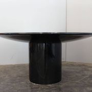 Black lacquered glass table and glass in the hoof style, Italy.