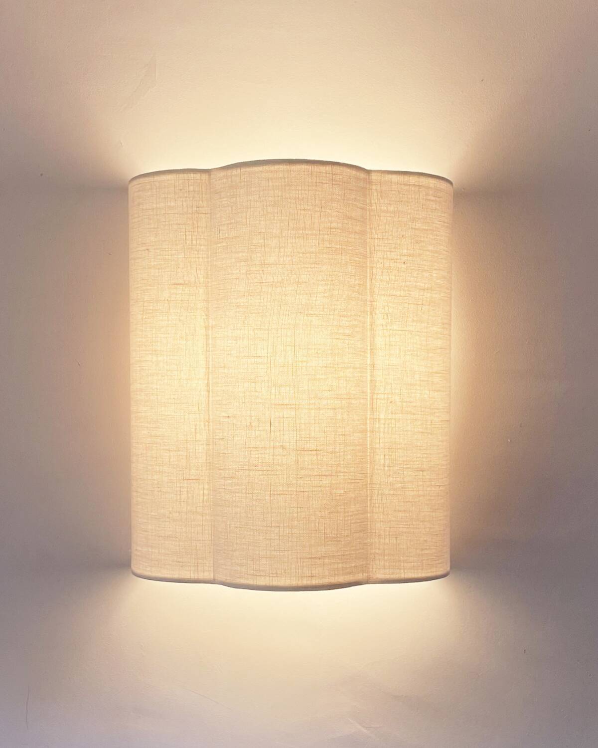 Pair of ecru linen wall lights