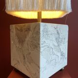 Beige marble stucco base, Houles white ecru fringed lampshade.