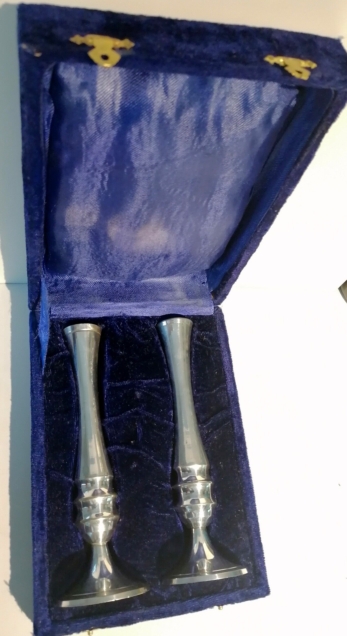 Pair of silver metal candle holders