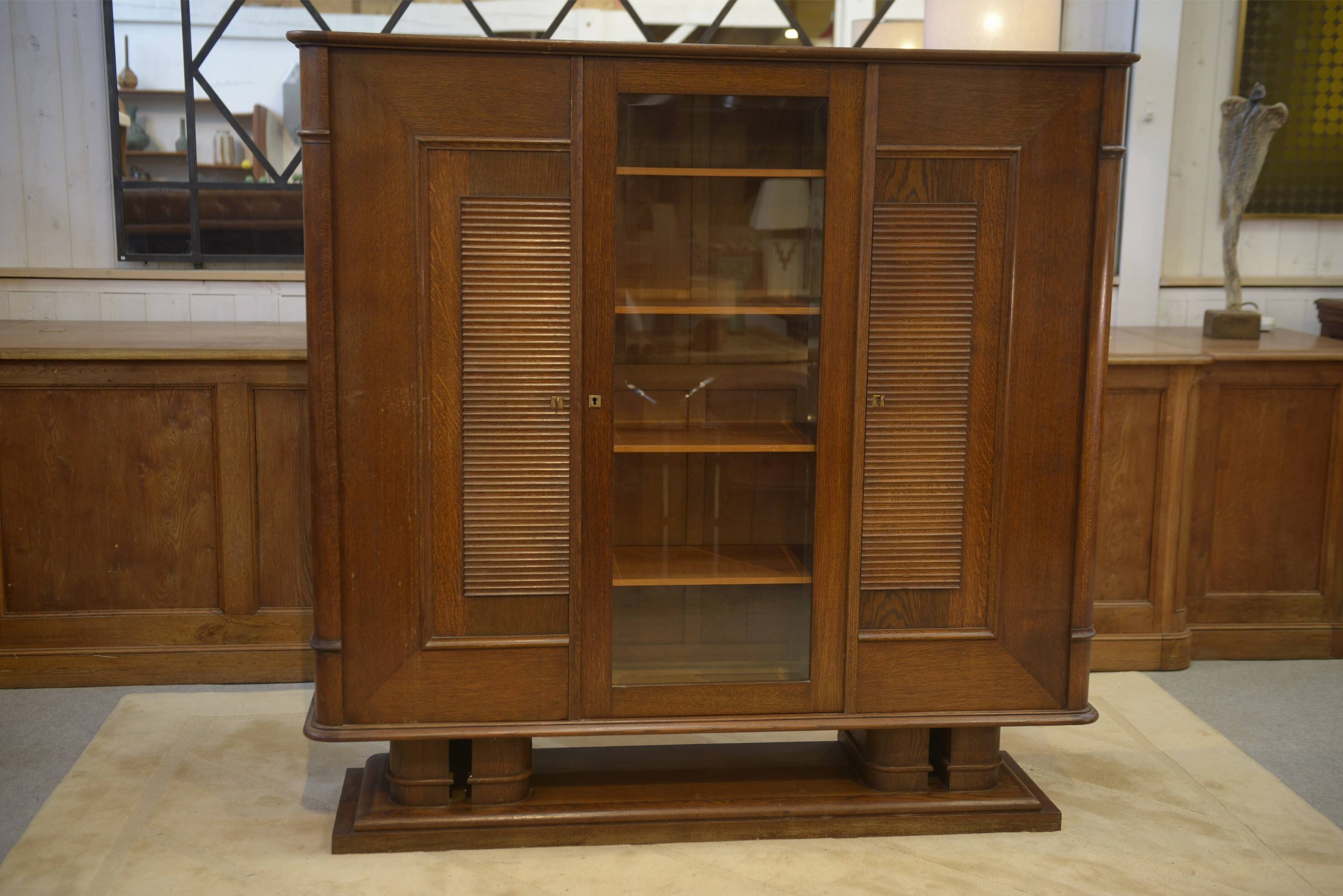 Brutalist display cabinet in oak by Charles Dudouyt, 1940s.