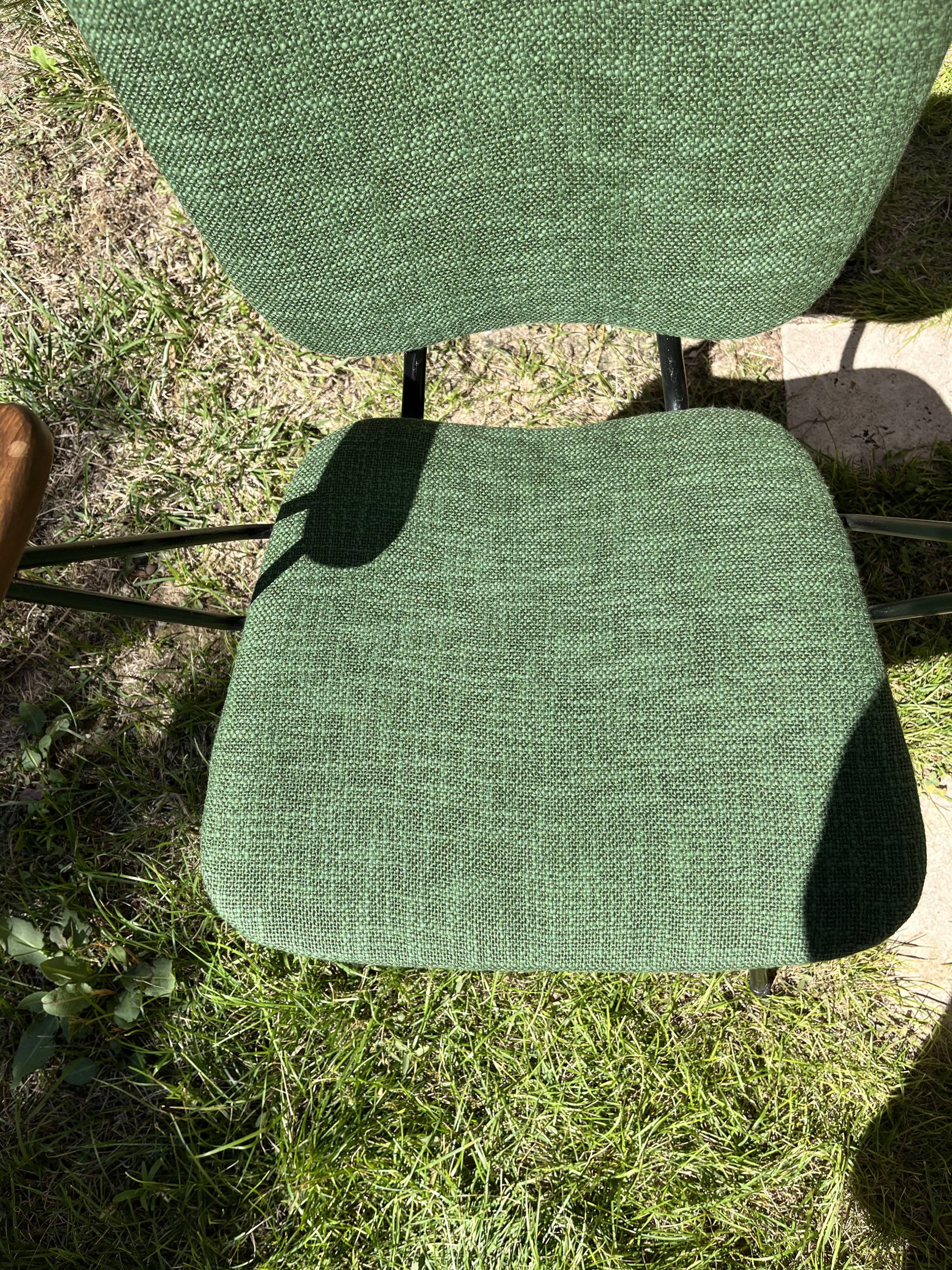 50s chair with armrests.
