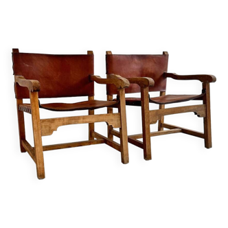 Paire de fauteuils design brutaliste, cuire et bois, Espagne 1960