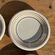 Set of 9 small Italian dessert plates Primula with red and green trim.