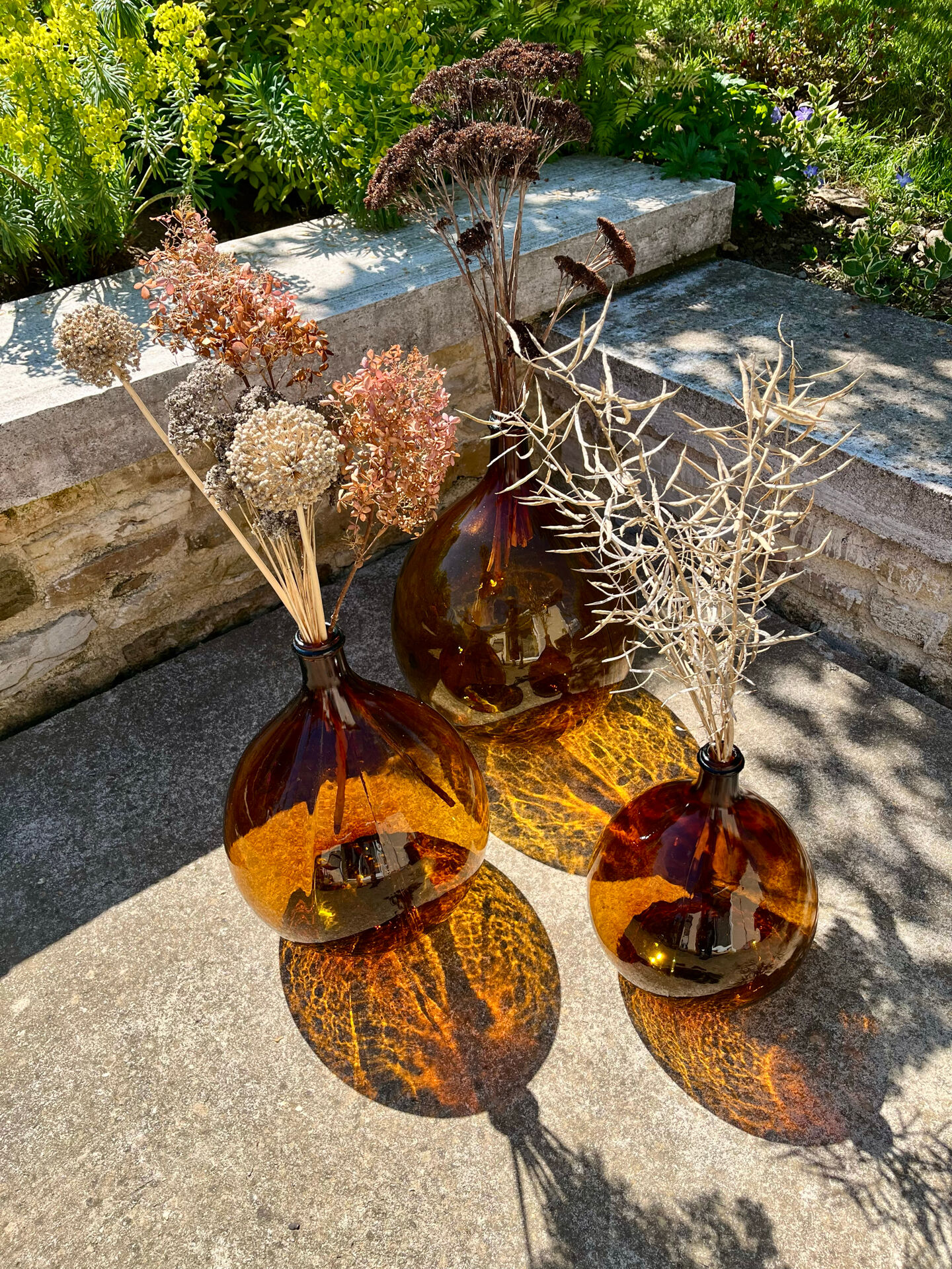 Lot de 3 dame-jeanne ambrées