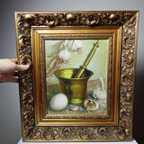 Still life with garlic, egg, and mortar signed Sarpe, 1979, oil on canvas.